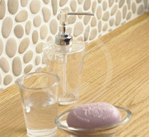 Stone clading - solid stone pebbles on mats - mosaic