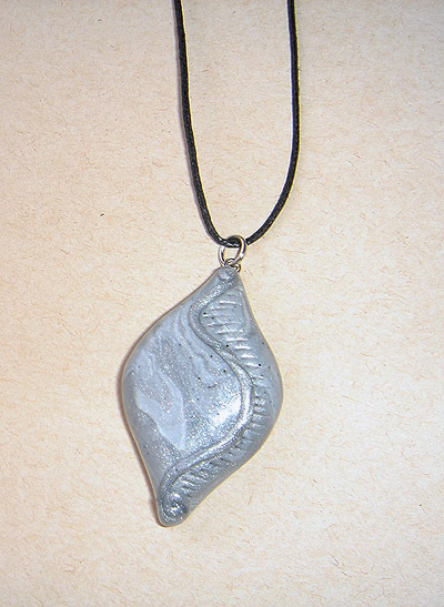 Unique, handmade pendant in the colour of siver sand for men.