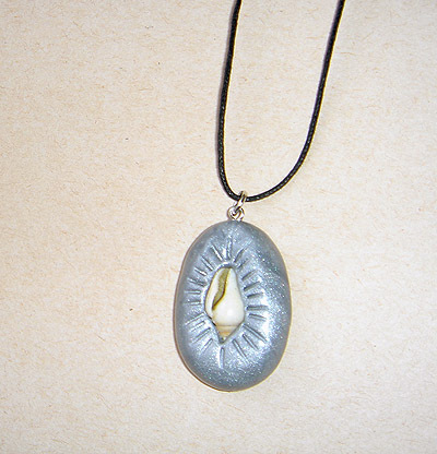 Unique, handmade pendant with a seashell.