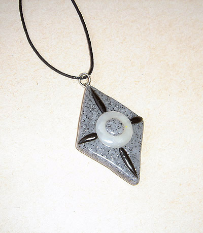 Unique, handmade pendant in the colour of sand for men.