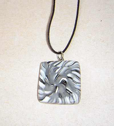 Unique, handmade grey-white-transparent-black pendant for men.